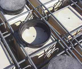 Close up of PolyDome Floor Insert Sytem at building site.